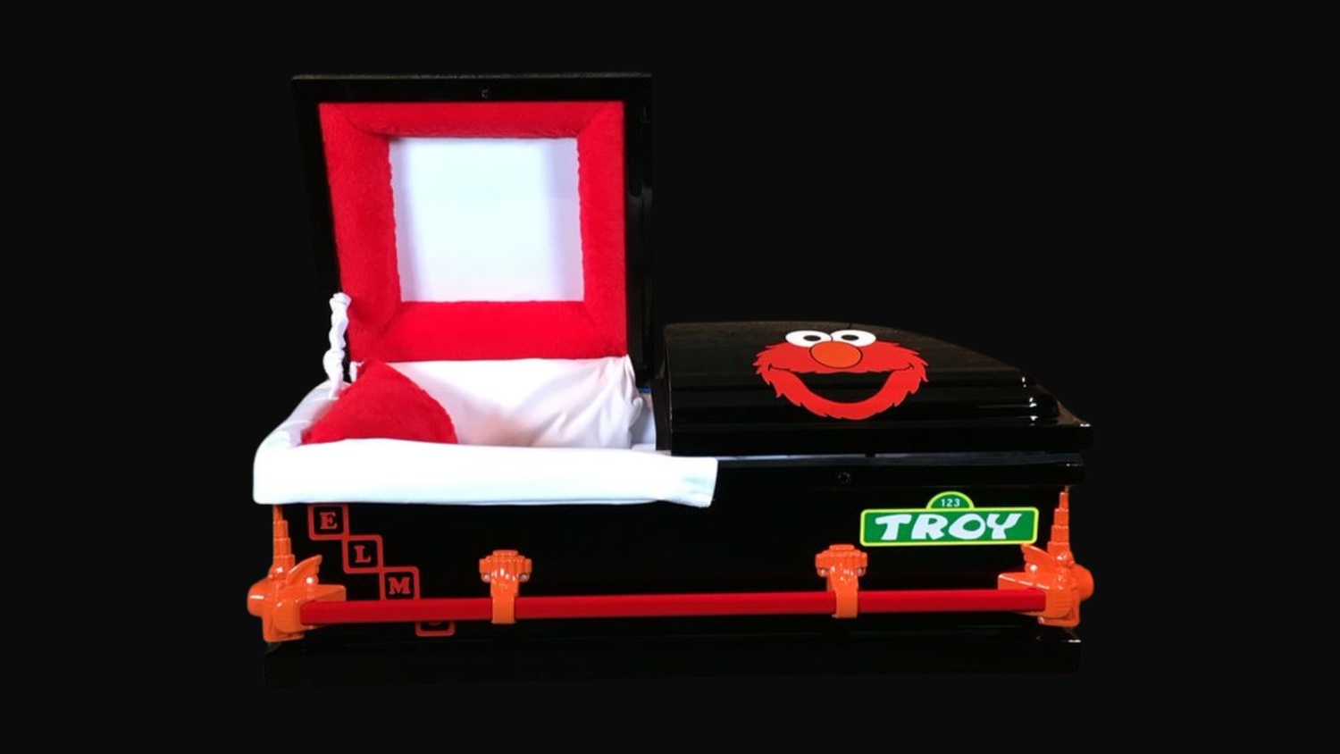 A custom SoulShine Elmo casket personalized for a child