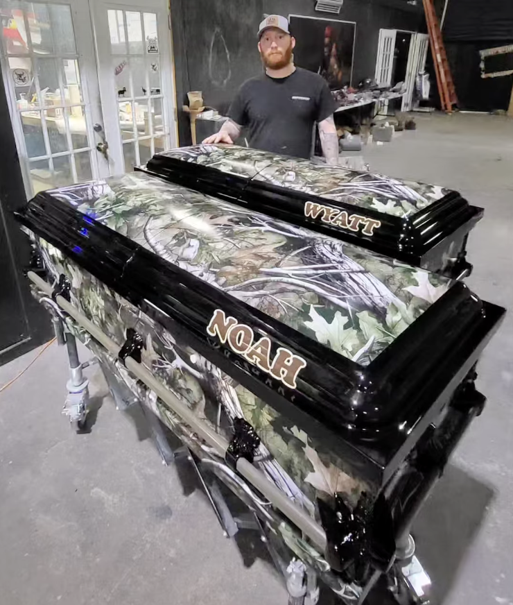 Billy Ganem, Operations Director at SoulShine Industries, with a custom camo casket