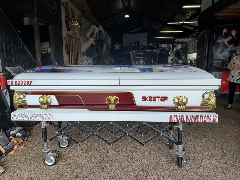 White and maroon casket styled as a Skeeter bass boat with TX 8272KF and Michael Wayne Flora Sr.