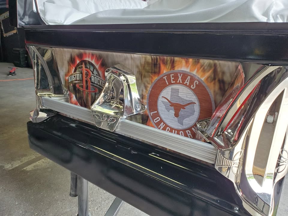 Black casket side panel wrapped with Houston Rockets and Texas Longhorns logos in flames