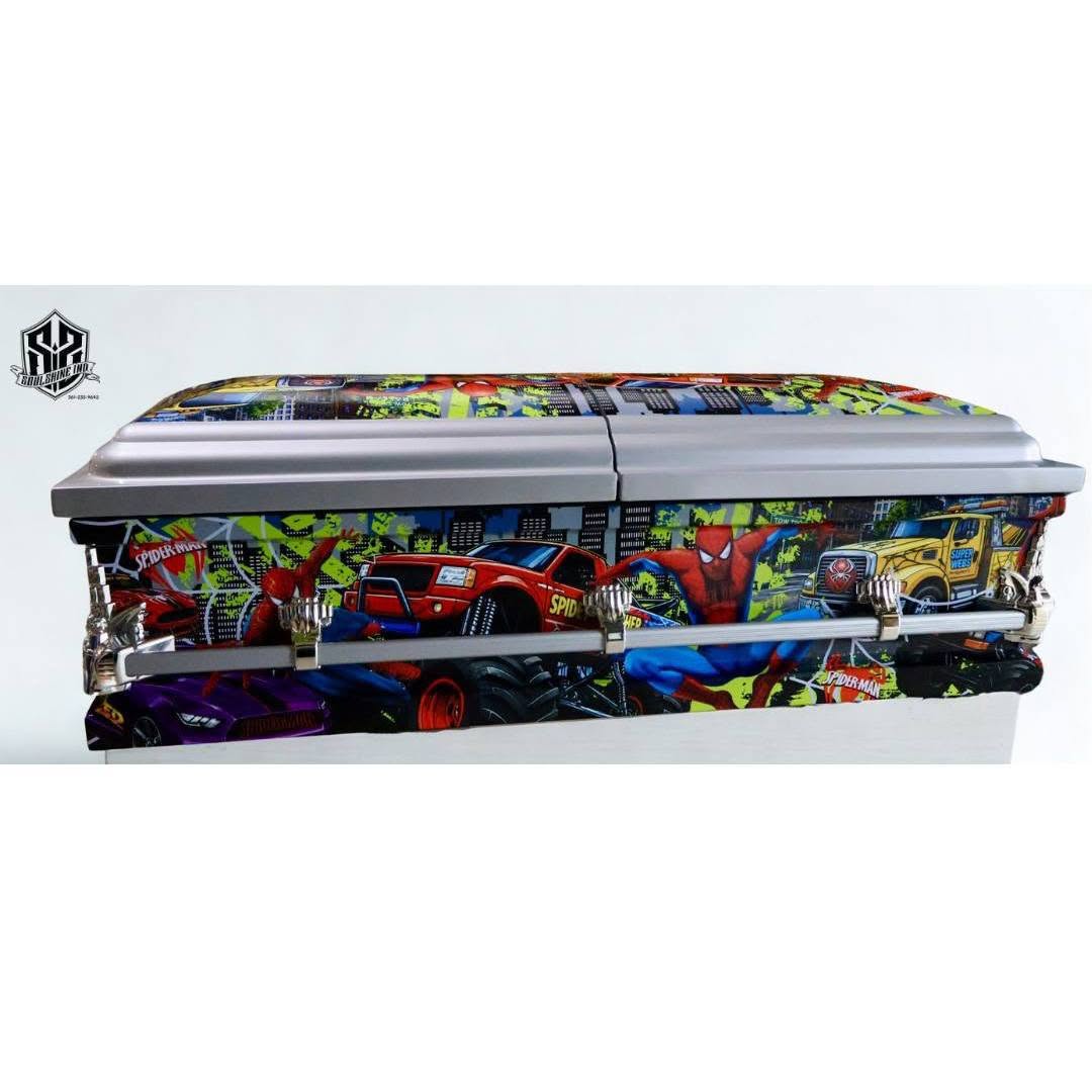 Spider-Man and monster truck comic wrap around a silver lidded child casket with chrome rails