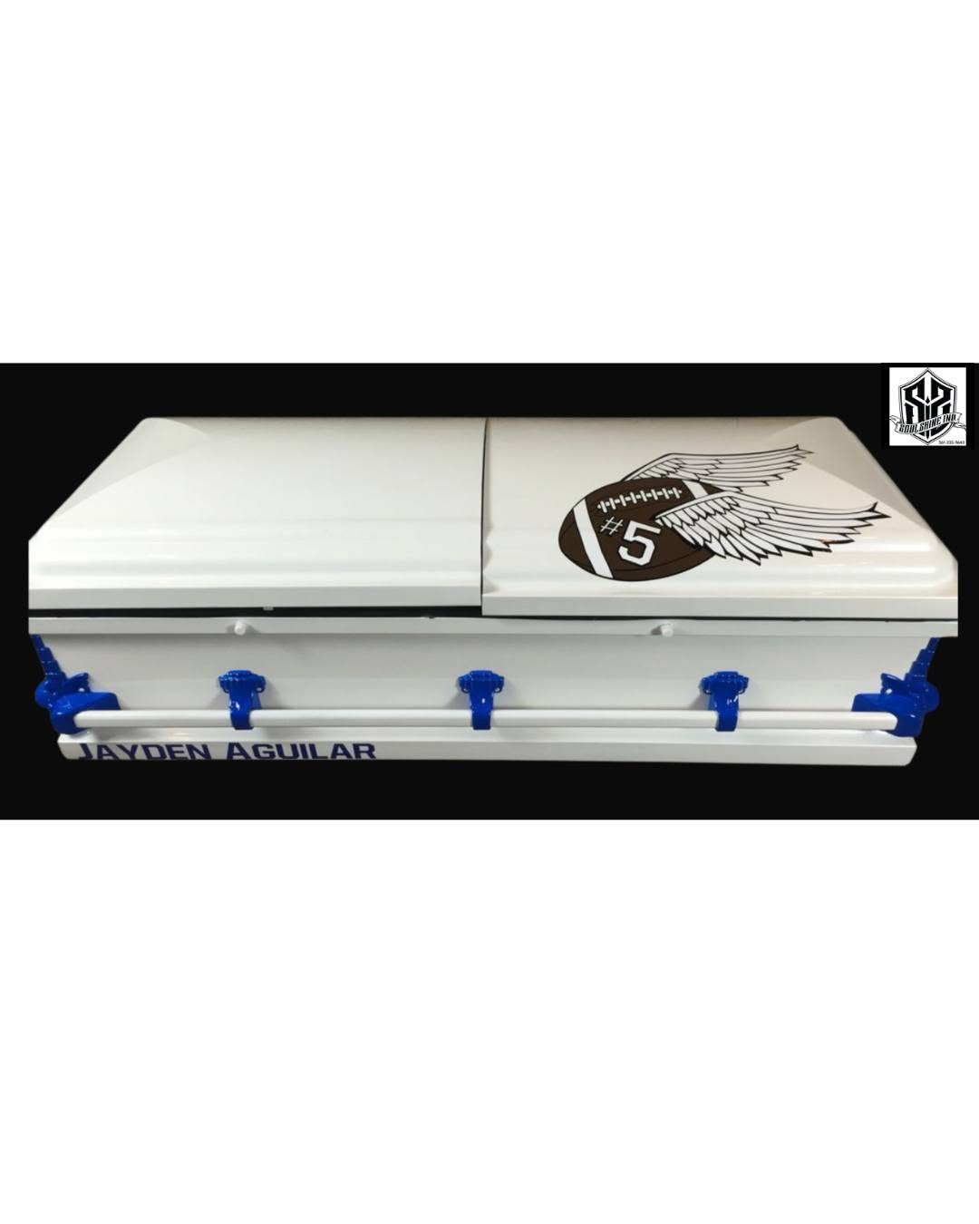 White child casket with a winged football number 5 and blue hardware, named Jayden Aguilar